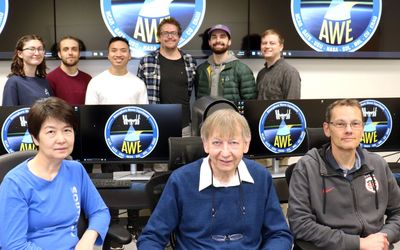 Mike Taylor pictured in 2023 with members of USU Physics' Atmospheric Waves Experiment (AWE) Science Team.