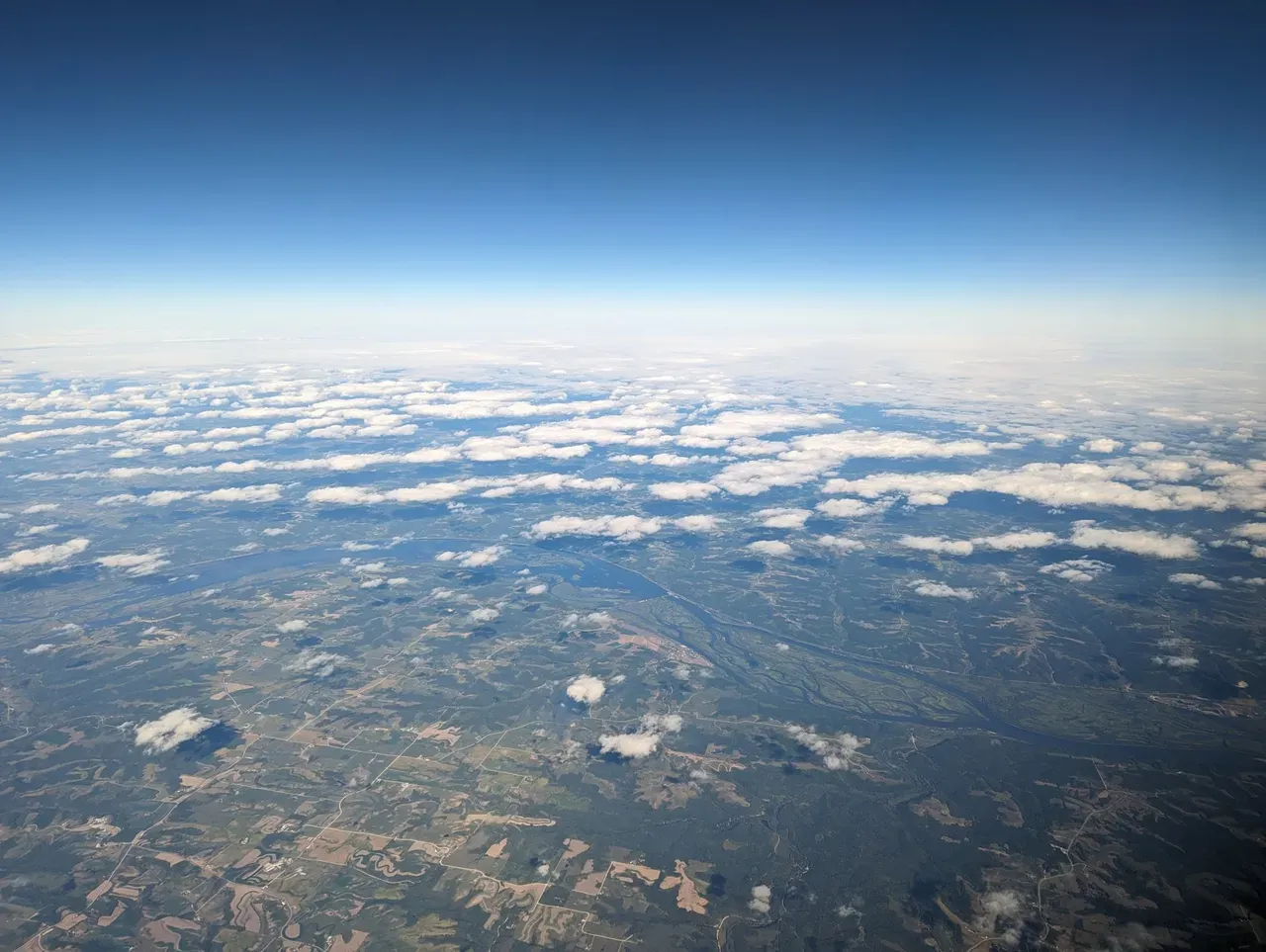 This photo shows examples of cloud patterns caused by atmospheric gravity waves (AGWs).