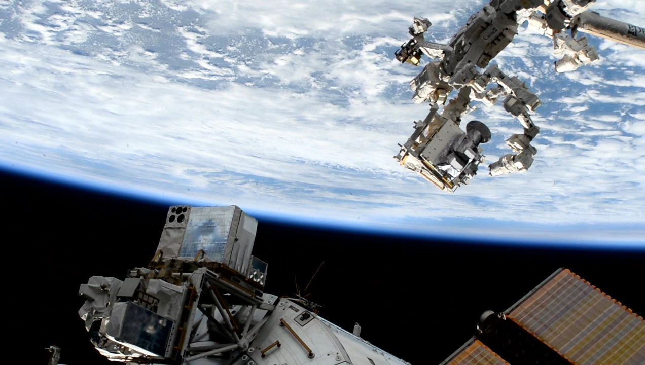 NASA’s Atmospheric Waves Experiment (AWE) extraction from SpaceX’s Dragon cargo spacecraft onboard the International Space Station.