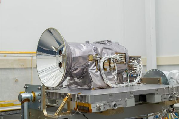 The Atmospheric Waves Experiment (AWE) flight instrument sits on a support structure in a clean room. Credits: Allison Bills/SDL